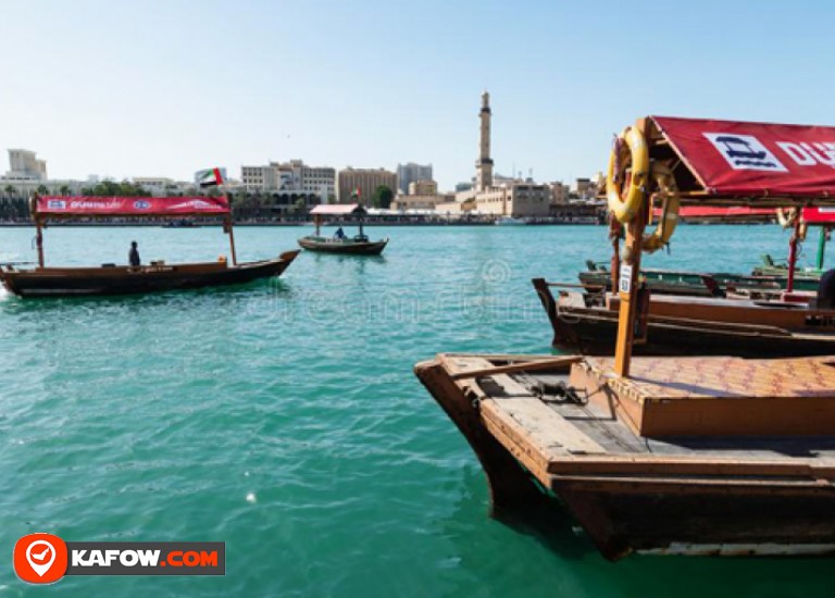 From the mainland to the water .. Bus transporting visitors between the landmarks of ancient Dubai